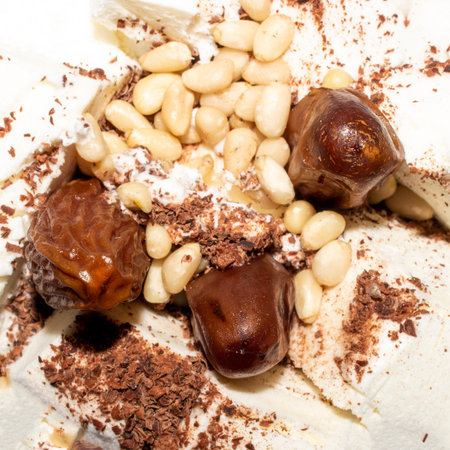 Ice cream with chocolate and nuts.Ice cream with pine nuts.Ice cream with chocolate chips.Ice cream by weight background.の写真素材