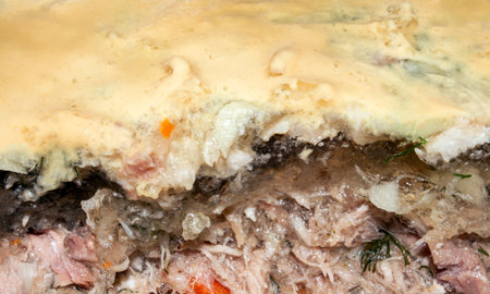 Russian homemade meat jelly.Hearty cold jelly.Meat aspic.Meat base in jelly.Meat snack in the form...