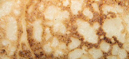 Pancakes texture. Pancakes background. Homemade pancakes with a golden crust. Pancakes from the...