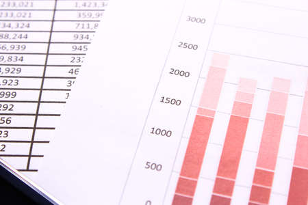 Finances and economic background with calculator and phoneの写真素材