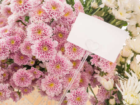 blank white card with flower in flower shopの写真素材