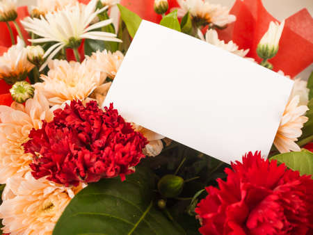 blank white card with flower in flower shopの写真素材