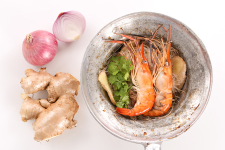 Thai baked shrimp with glass noodle in white background - top viewの写真素材