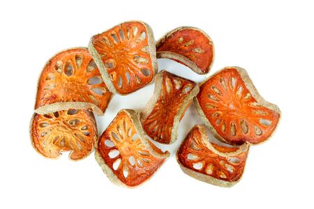 Dry bael fruit on white backgroundの写真素材