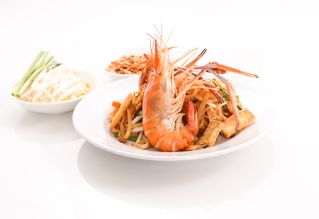 Thai cuisine - Pad Thai, stir-fried rice noodle dish with shrimp - close upの写真素材
