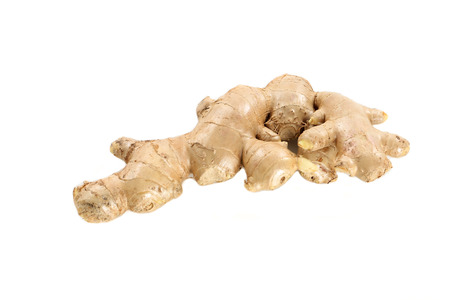 Isolated fresh ginger on white backgroundの写真素材