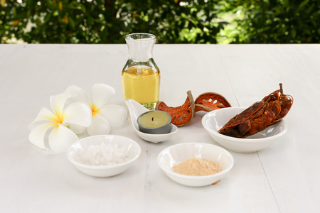 Spa composition with Thai herb, oil and  Plumeria flower on bokeh backgroundの写真素材