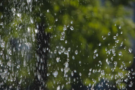 Nitidous splashes of water in a spoutの写真素材