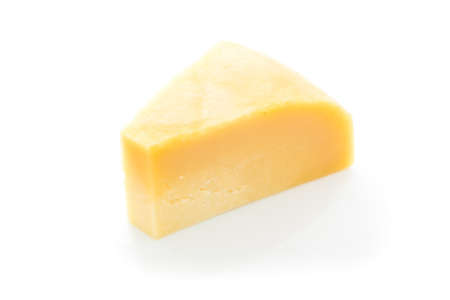 piece of cheese isolated on a white backgroundの写真素材