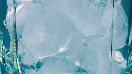 A Detailed CloseUp of Ice Cubes Nested in a Refreshing Glass, Perfectly Chilled for Enjoyment
