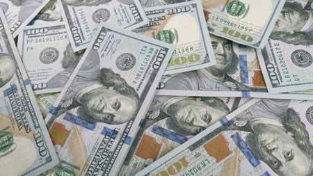 A Stack of U.S. Dollar Bills Carefully Arranged in a Neat Pile for Viewing and Handling