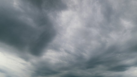 The Dramatic Overcast Sky Filled with Layered Clouds Creates a Stunning Visual Experience