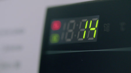 The digital display timer on your washing machine shows the progress of the current cycle