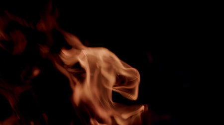 Warm Abstract Flames on a Dark Background for Inspired Creative Media Projects and Moreの写真素材