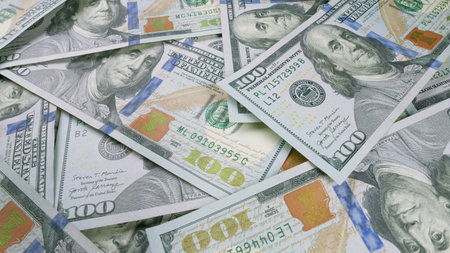There Are Numerous Scattered U.S. Dollar Bills That Are Present in Great Abundance Around the Areaの写真素材