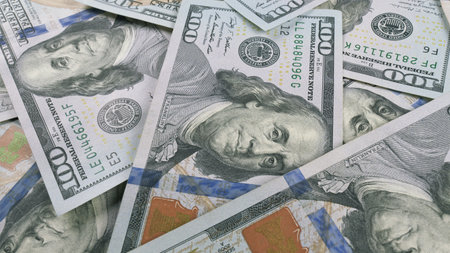 Stacks of 100 Dollar Bills Beautifully Spread Out Across the Entire Surface Area Available