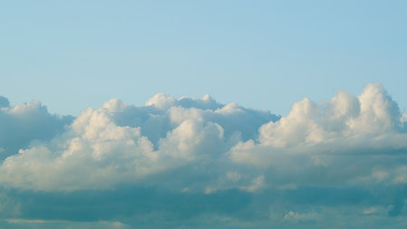 Serene Cloudscapes Delicately Floating Under Clear Blue Skies Creating an Idyllic Sceneの写真素材
