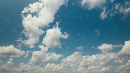 Time lapse. Beautiful and Scenic Cloudy Sky with a wonderful Blue Background, showcasing natures beautyの写真素材