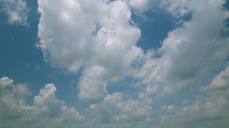 Time lapse. The Beautiful Cloudy Skies Provide a Stunning View in Natural Light During Summerの写真素材