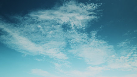 Time lapse. Experience the Vast Blue Sky and Wispy Clouds Relish Tranquil Moments in Natureの写真素材