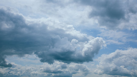 Witness the dynamic and everchanging cloud patterns in a stunning blue sky overhead