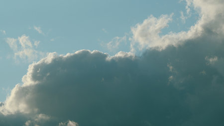 A Stunning and Dramatic Cloud Formation in an Expansive Blue Sky Above the Horizon