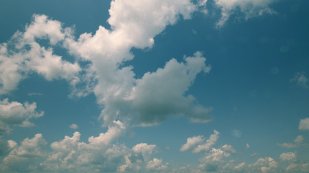 Time lapse. A Serene and Cloudy Sky Displaying a Beautiful Blue Hue that Captivates the Imagination