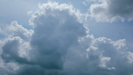Dynamic and Stunning Cloud Patterns Forming Beautifully in a Clear Blue Sky Above