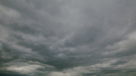 A Dramatic and Overcast Cloudy Sky Above a Stunning Landscape That Captivates the Eye