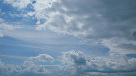 A Beautiful and Majestic Cloudy Sky Featuring Soft and Dreamy Blue Hues and Colors