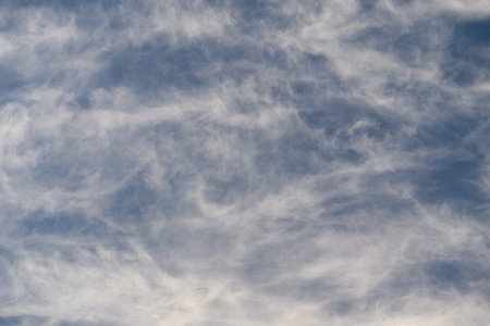 Stunning and Beautiful Cloud Patterns Gracefully Displayed Against a Clear Blue Sky