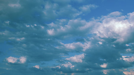 A Beautifully Dramatic Cloudy Sky Displayed with Subtle Blue Tints and Soft Illuminating Lighting