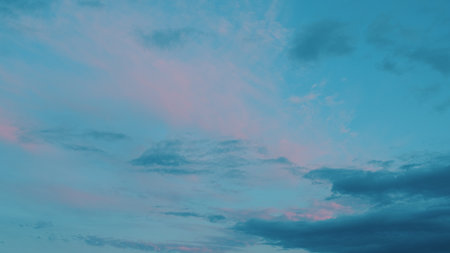 Serene and Beautiful Sky Transition from Daytime to Nighttime as the Sun Sets and Fadesの写真素材