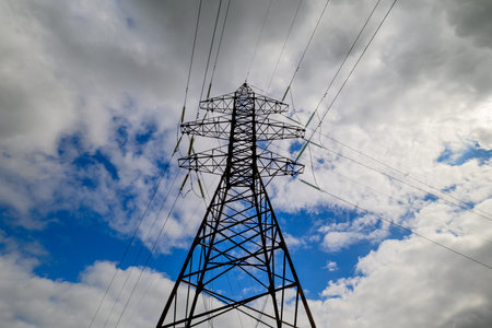 High Voltage Power Lines Set Against a Dramatic and Striking Sky, the Aesthetic Backdrop
