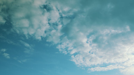 A Serene Sky with Fluffy Clouds The Perfect Choice for Beautiful Backgrounds to Use