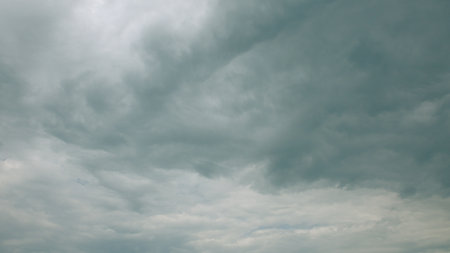 An Overcast Sky Filled with Dramatic and Intriguing Cloud Patterns Surrounding Us in Nature