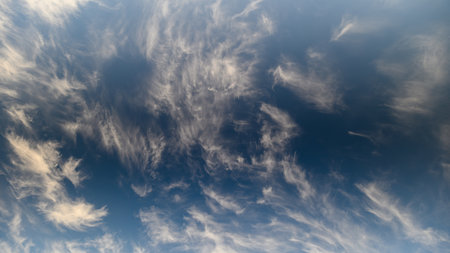 Sky clouds drift, White wispy clouds float peacefully, Serene cirrus formations glide through azure...