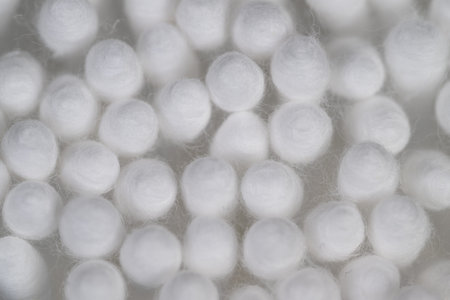 Cotton swabs manufacturing. Repetitive pattern in sterile industry production. Macro perspective...