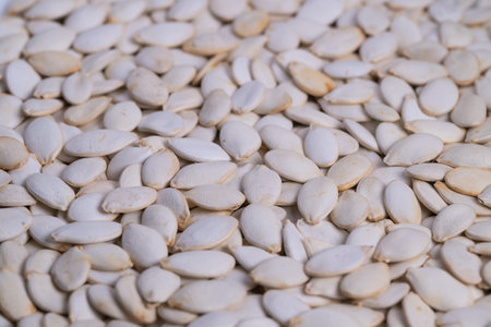Pumpkin seeds nutrientrich, Closeup of roasted pumpkin kernels, Highprotein pumpkin seeds...