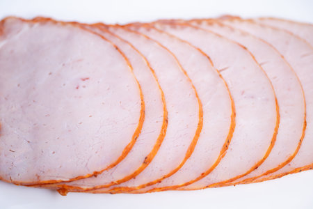 Thin sliced meat arranged on white background, even spacing, bright lighting, moist texture and...