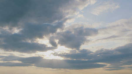 Enjoy captivating sky views during a mesmerizing sunset with beautiful cloud patterns