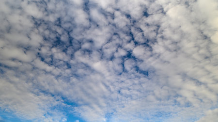 Expansive sky scenes featuring textured clouds and serene ambiance, Wide sky landscapes showcasing...