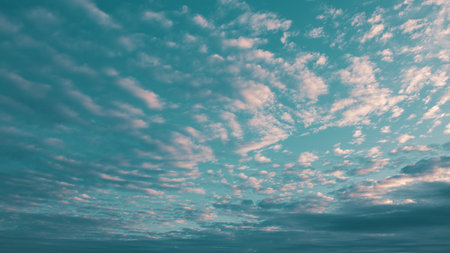 A Beautiful and Tranquil Sky Beautifully Filled with Soft and Fluffy Clouds at Dusk Time of the Day