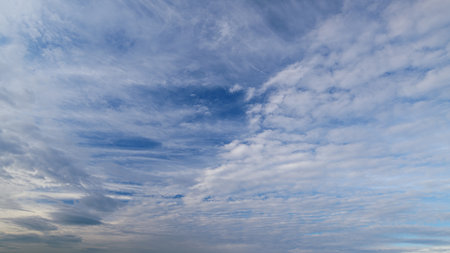 A stunningly beautiful sky filled with magnificent cloud patterns and vibrant blue hues