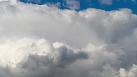 The Dynamic Cloud Formation Stands Out Beautifully Against a Bright Blue Sky Above