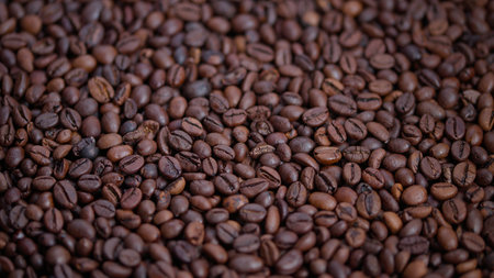 Artisan roasted bean imagery display, High detail photograph showcasing rich brown roasted coffee...