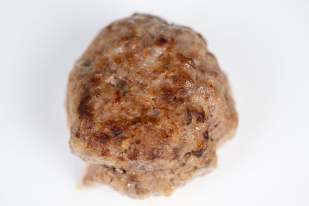 Photographed cutlet on bright background. Studio shot of crispy cutlet with detailed focus....