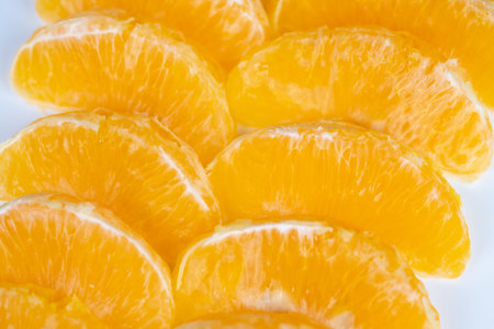 Fresh orange segments evoking summer refreshment and picnic vibe, cool bright tones and hydration suggestion, perfect for beverage or outdoor lifestyle promotions