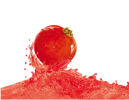Tomato in water splash isolated on white background with clipping path.の写真素材