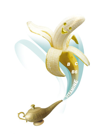 Banana and magic lamp isolated on a white background.の写真素材